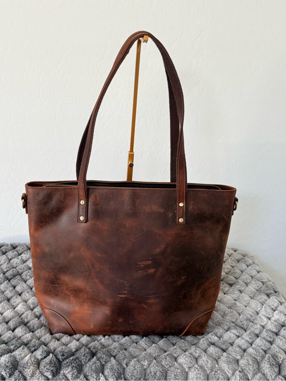 Handmade, heavy full-grain leather utilitarian totes by Stone.